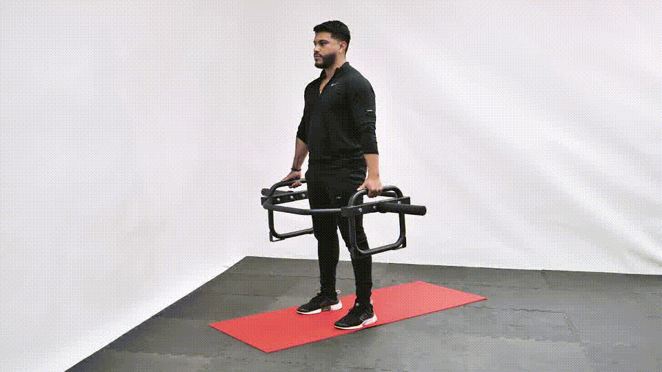 تمرین شراگ با ترپ بار: قدرت، فرم و حجم در عضله تراپز